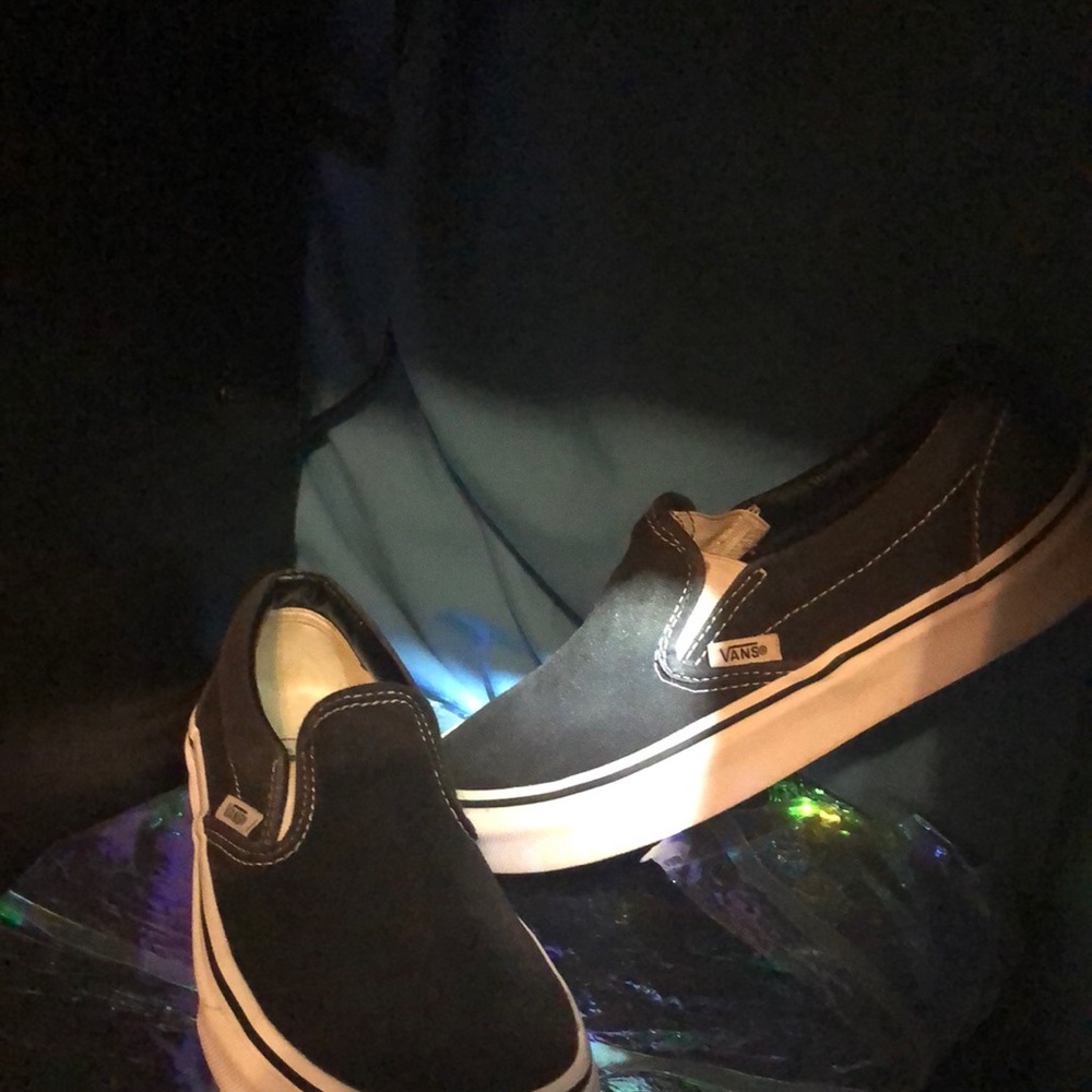 BLACK AND WHITE SLIP ON VANS